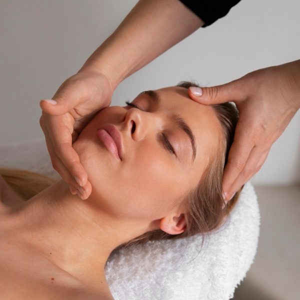 female-masseur-giving-back-massage-client_23-2150461455
